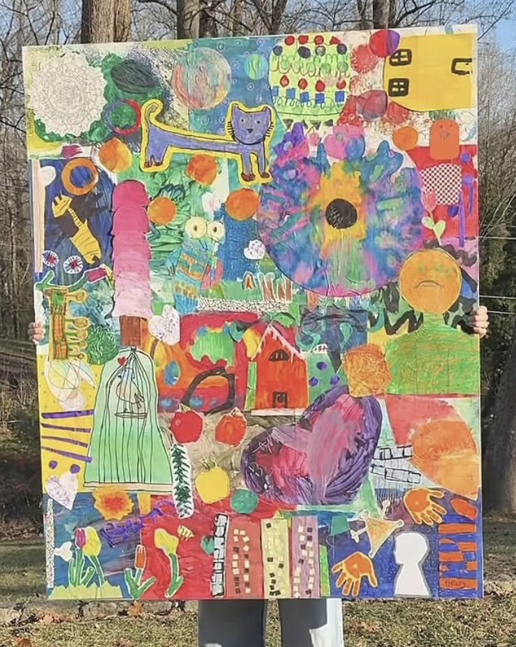 孩子共同完成的大型拼貼畫作品